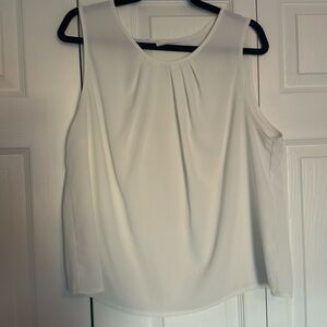 White pleated sleeveless blouse